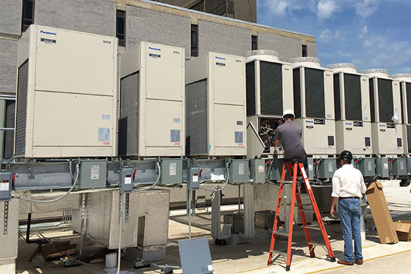 Climate Care team installing VRF system